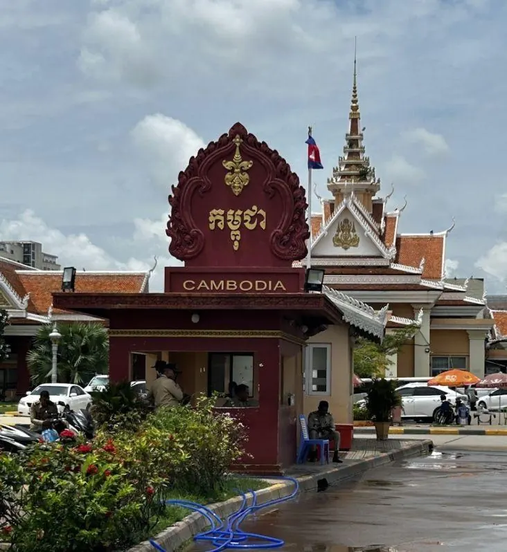 Cambodia sign and guard post in front of the Bavet checkpoint